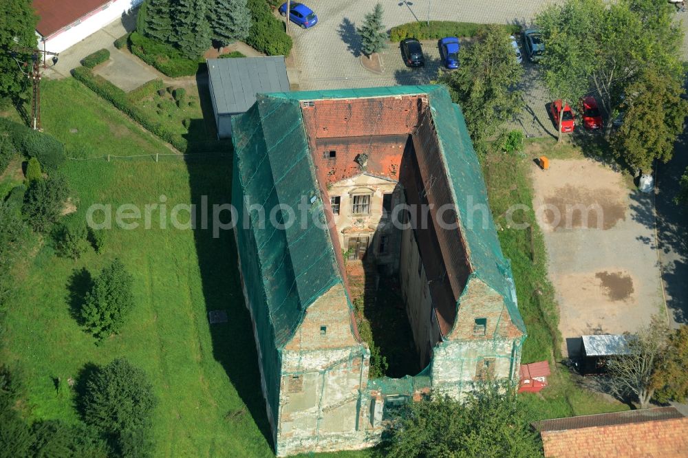 Aerial image Langenleuba-Niederhain - Halbes Schloss Castle in the village centre of Langenleuba-Niederhain in the state of Thuringia. The historic building is being renovated