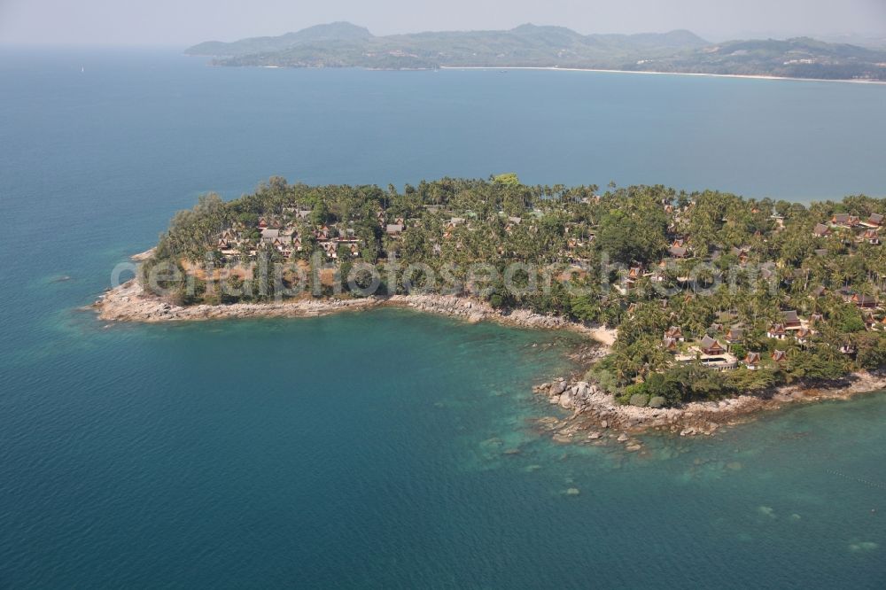 Choeng Thale from above - Peninsula at Choeng Thale on the island of Phuket in Thailand. On it is located the Amanpuri Resort, a luxury hotel under palm trees