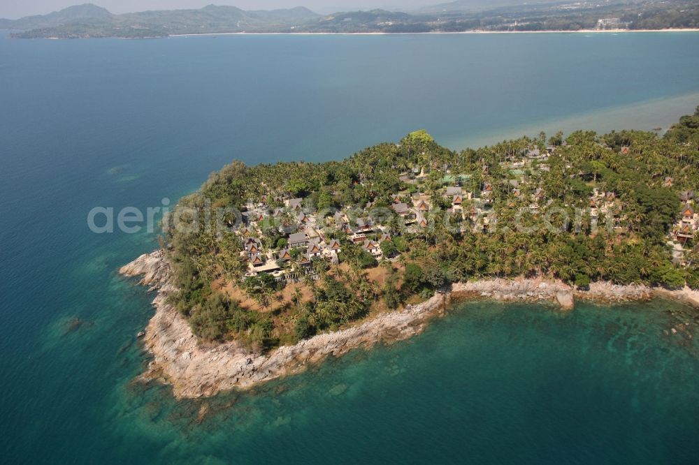 Choeng Thale from above - Peninsula at Choeng Thale on the island of Phuket in Thailand. On it is located the Amanpuri Resort, a luxury hotel under palm trees