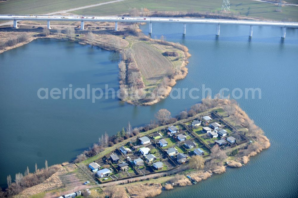 Aerial image Rattmannsdorf - 09/03/2012 RATTMANNSDORF view of the peninsula with small garden on the lake in Rattmannsdorf