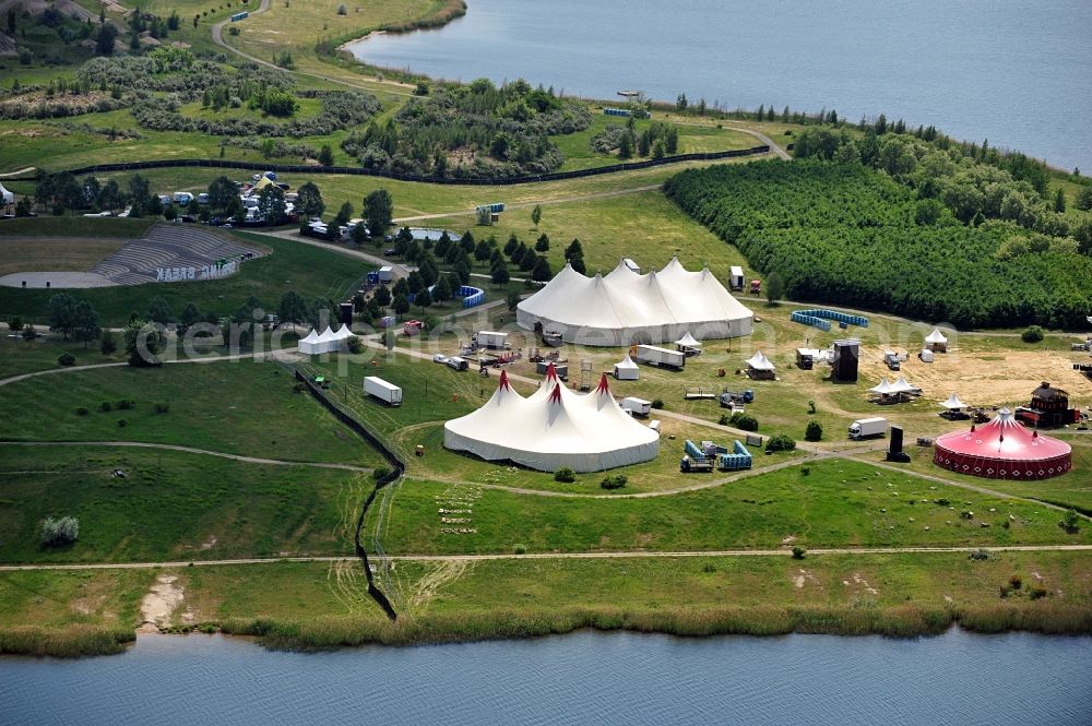 Aerial image Muldestausee - Preparations for the Sputnik Spring Break 2012 Festival on the Pouch peninsula in the town of Muldestausee in Saxony-Anhalt