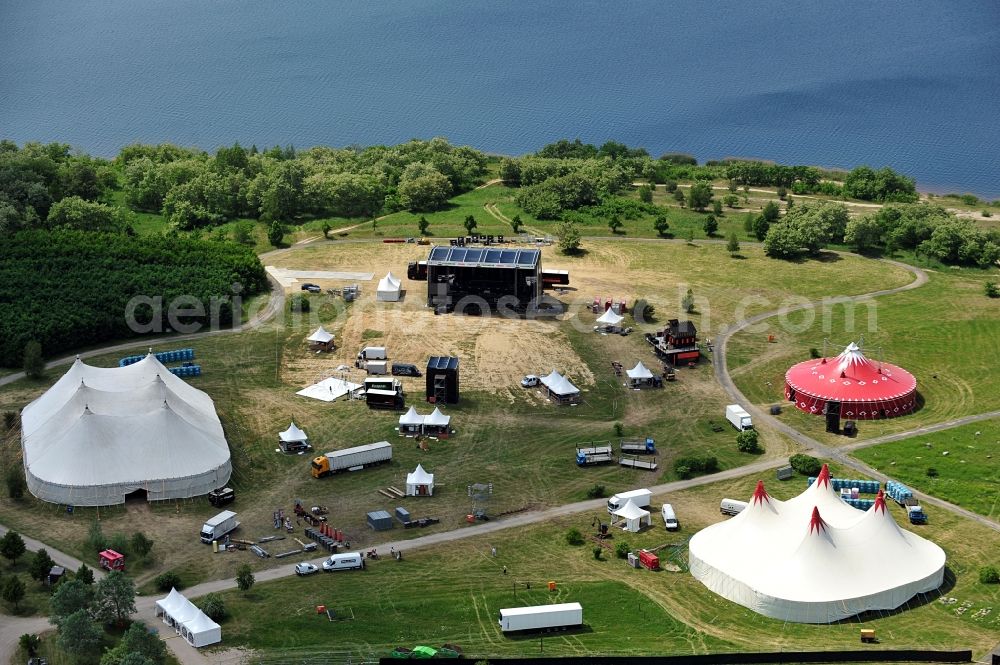 Muldestausee from the bird's eye view: Preparations for the Sputnik Spring Break 2012 Festival on the Pouch peninsula in the town of Muldestausee in Saxony-Anhalt