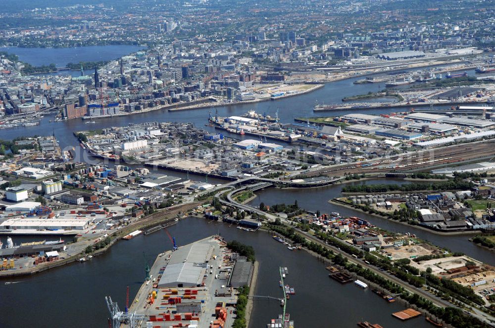 Aerial photograph Hamburg - Blick auf den Hamburger Hafen im Bereich Kleiner Grasbrook und Steinwerder. Im Hintergrund die Stadtmitte mit der Außenalster und Binnenalster.