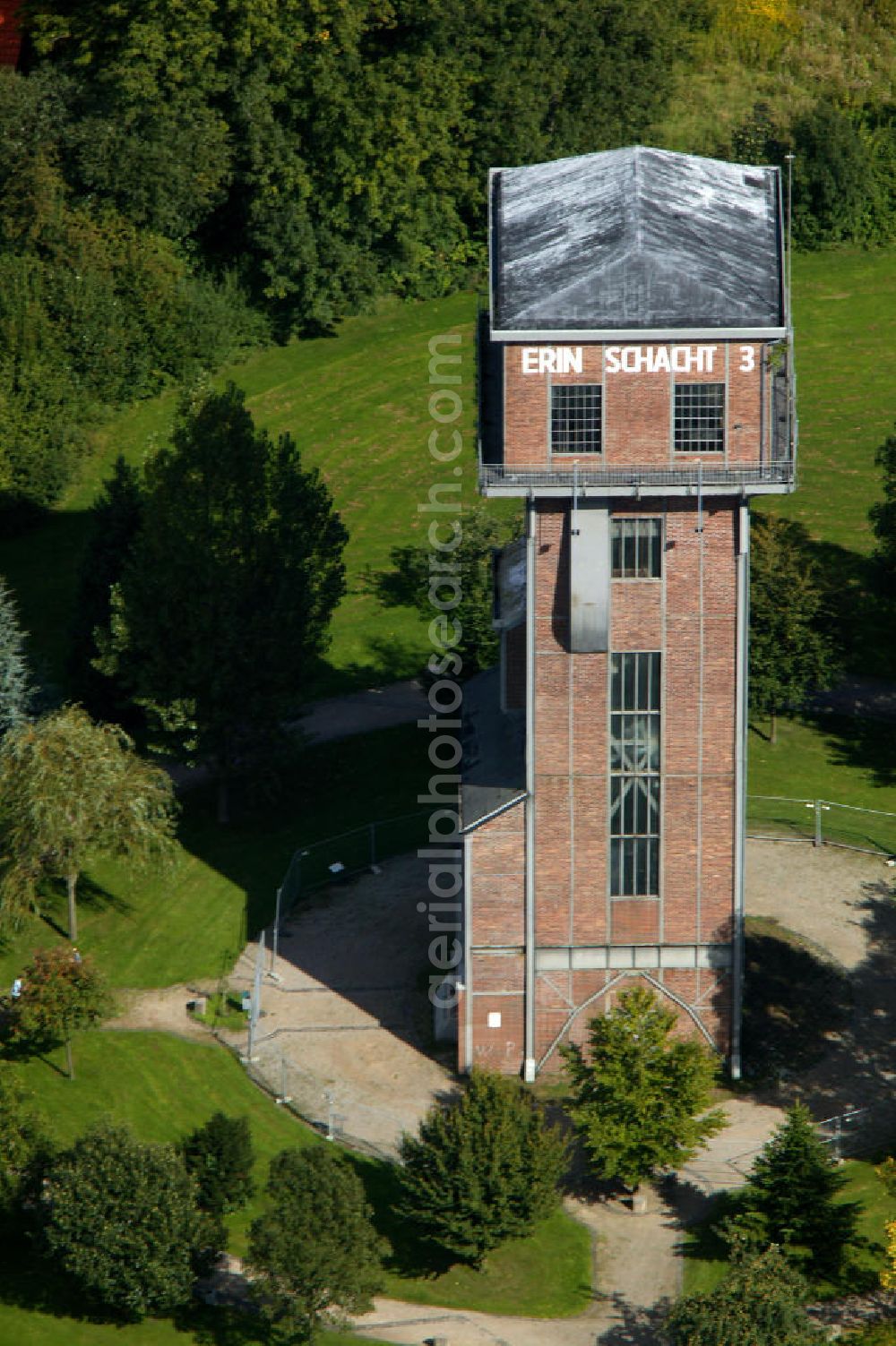 Aerial photograph Castrop-Rauxel - Blick auf den Hammerkopfturm in Erin von Schacht 3. Castrop-Rauxel industrial monument and former coal mine ERIN with winding tower in form of a hammerhead.