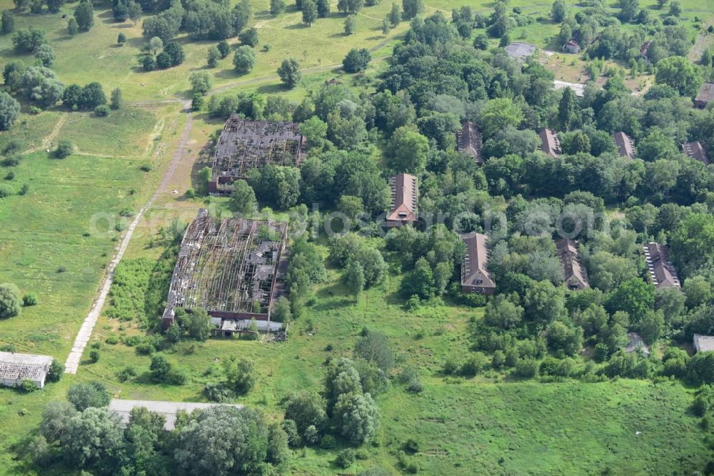 Schönwalde-Glien from the bird's eye view: Building complex of the former military barracks former airfield in Schoenwalde-Glien in the state Brandenburg