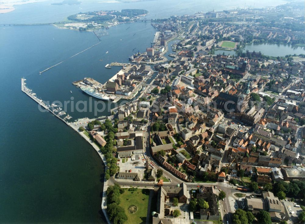 Aerial image Stralsund - Blick auf die Hansestadt Stralsund, eine kreisfreie Stadt in Mecklenburg-Vorpommern im Norden Deutschlands. Die Stadt liegt am Strelasund, einer Meerenge der Ostsee, und wird auf Grund ihrer Lage als Tor zur Insel Rügen bezeichnet. Die Altstadt gehört seit 2002 zum UNESCO-Weltkulturerbe.