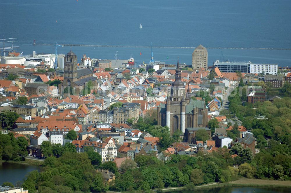 Aerial photograph Stralsund - Blick auf die Hansestadt Stralsund, eine kreisfreie Stadt in Mecklenburg-Vorpommern im Norden Deutschlands. Die Stadt liegt am Strelasund, einer Meerenge der Ostsee, und wird auf Grund ihrer Lage als Tor zur Insel Rügen bezeichnet. Die Stadt ist zusammen mit Greifswald eines der vier Oberzentren des Landes. Die Altstadt gehört seit 2002 zum UNESCO-Weltkulturerbe.