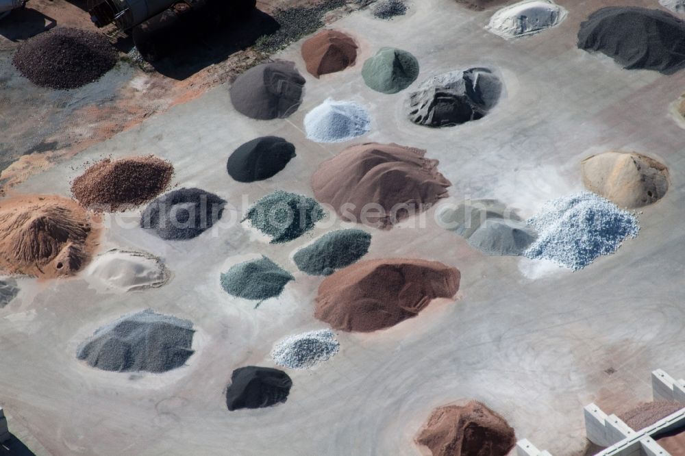 Aerial photograph Graben-Neudorf - Piles of coloured gravel in the depot of Badische Terrazzo Handelsgesellschaft mbH in the district Neudorf in Graben-Neudorf in the state Baden-Wuerttemberg