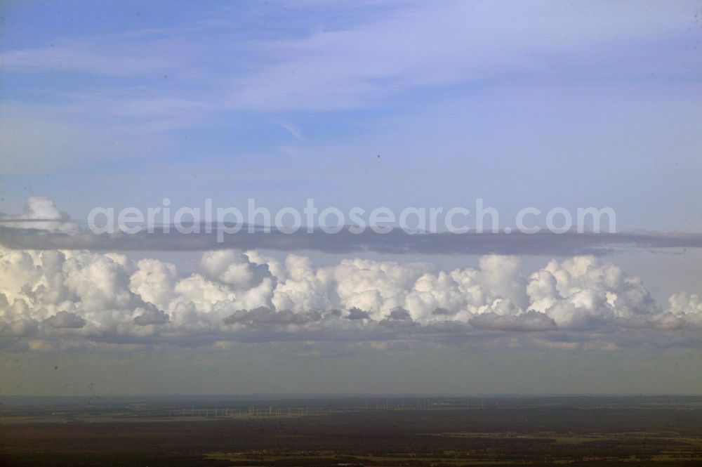 Remplin from above - An elongated cumulus spans the region at the Mecklenburg Switzerland Remplin in the state of Mecklenburg-Vorpommern. In the background wind turbines can be seen