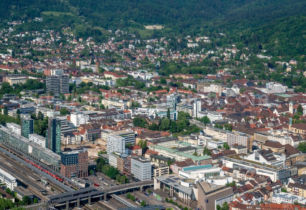 Freiburg im Breisgau from above - Track progress and building of the main station of the railway in Freiburg im Breisgau in the state Baden-Wuerttemberg, Germany