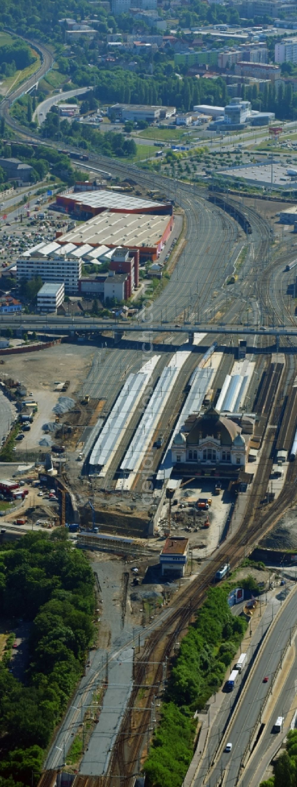 Pilsen from above - Construction site of track progress and building of the main station of the railway in Pilsen in Boehmen, Czech Republic