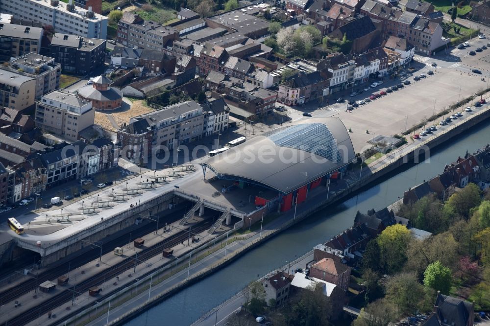 Halle from above - Track progress and building of the main station of the National Society of Belgian Railways (NMBS) at the Brussels-Charleroi Canal in Halle in Vlaan deren, Belgium