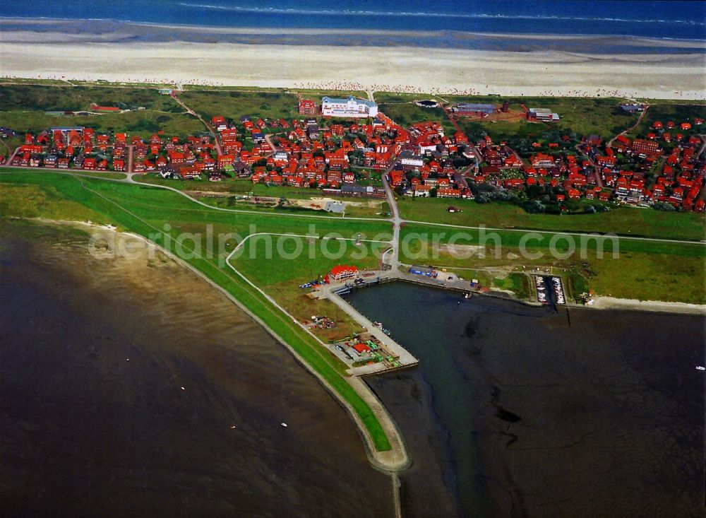 Juist from above - View of the main township of the longest East Frisian island Juist in the state Lower Saxony. Part of the island and the surrounding mudflat is part of the national park Wadden Sea of Lower Saxony. As a therapeutic spa the isle is a popular destination for tourists and as a health resort