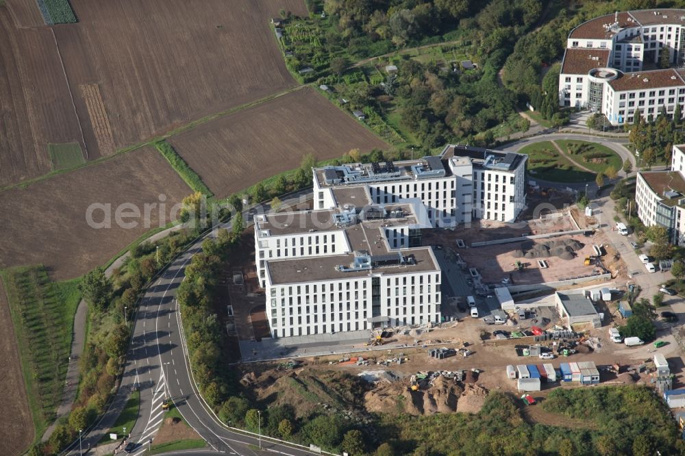 Aerial photograph Mainz - Site of the new headquarters of the professional association of wood and metal (BGHM) on Kisselberg at the Saarstraße in Mainz Gonsenheim in Rhineland-Palatinate, built by the building contractor Karl Gemünden