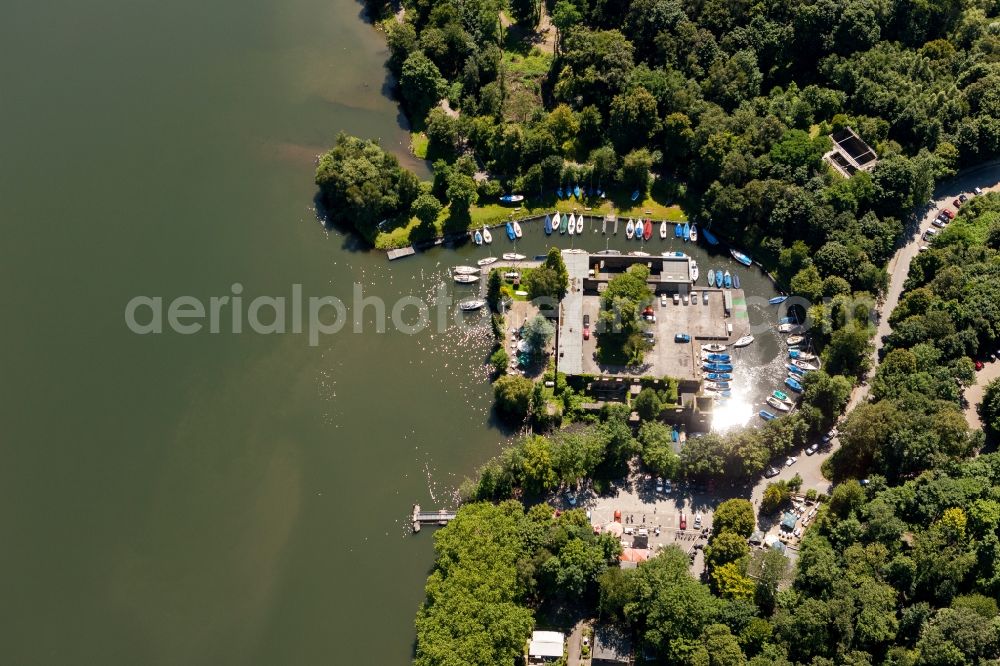 Essen from the bird's eye view: View onto the Haus Scheppen at the south bank of the Baldeney Lake in Essen in the state North Rhine-Westphalia. The Haus Scheppen is a former, noble fief. Today the club house and the sports port of the Essen Sailer and Canoe Club is located in the Hous Scheppen