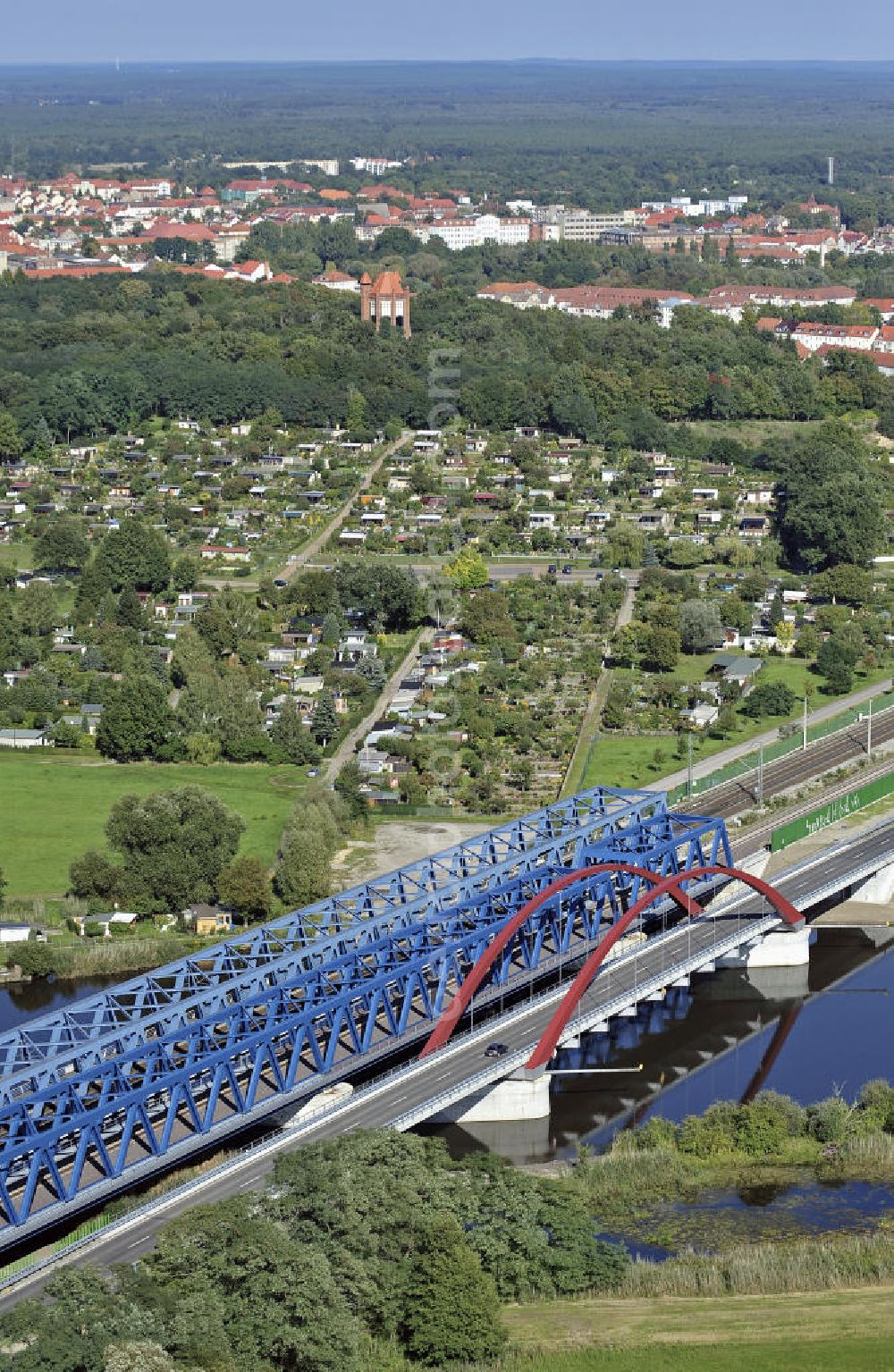 Rathenow from the bird's eye view: Blick auf den Neubau der Eisenbahnüberführung Havelbrücke Rathenow. In einer 1. Phase wurde die bestehende Brücke zurückgebaut, um Baufreiheit für die Ortsumfahrung B 188 Rathenow zu schaffen. Anschließend wird die dafür notwendige Straßenüberführung an gleicher Stelle errichtet. Bauherr: Deutsche BahnAG. Projektsteuerung SCHÜßLER-PLAN-Ingenieurgesellschaft. View of the new construction of the railroad overpass Havel Bridge Rathenow.