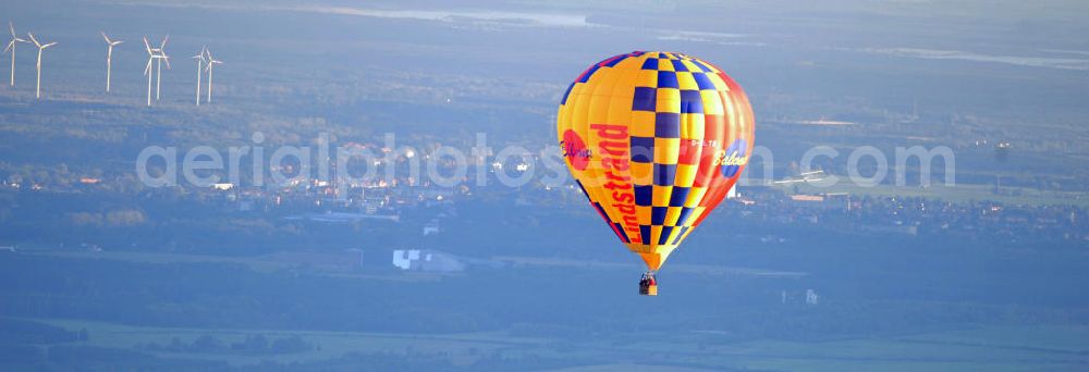 Cottbus from the bird's eye view: Ein Heißluftballon am Himmel über Cottbus, Brandenburg. Er ist von der Marke Lindstrand Balloons mit der Kennung D-OLTB. A hot-air ballon above Cottbus, Brandenburg. Its made by the trademark Lindstrand Ballons.