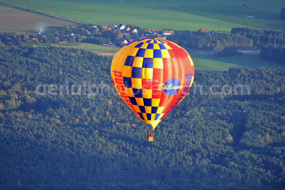 Aerial image Cottbus - Ein Heißluftballon am Himmel über Cottbus, Brandenburg. Er ist von der Marke Lindstrand Balloons mit der Kennung D-OLTB. A hot-air ballon above Cottbus, Brandenburg. Its made by the trademark Lindstrand Ballons.