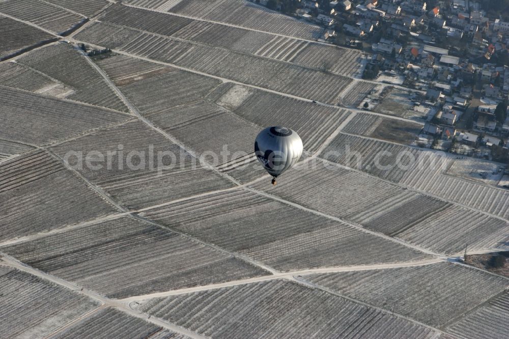 Winzenheim from above - Hot air balloon over winter covered with snow field landscape on the outskirts of Winzenheim, a district of Bad Kreuznach in Rhineland-Palatinate