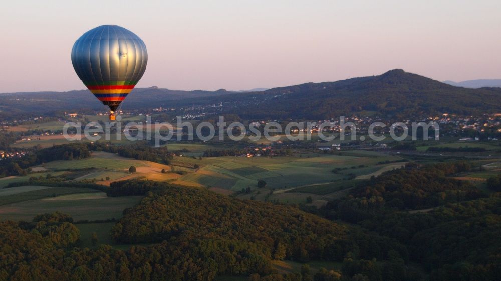 Hoholz from the bird's eye view: Hot air balloon flying over the airspace in Hoholz in the state North Rhine-Westphalia, Germany