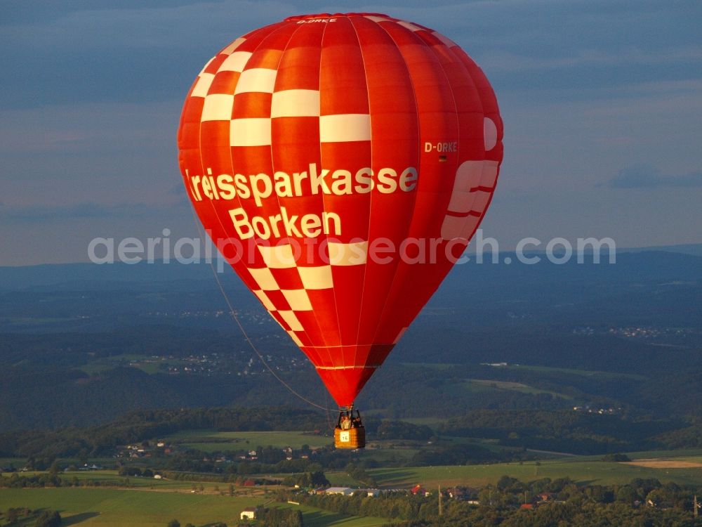 Königswinter from the bird's eye view: Hot air balloon flying over the airspace in Koenigswinter in the state North Rhine-Westphalia, Germany