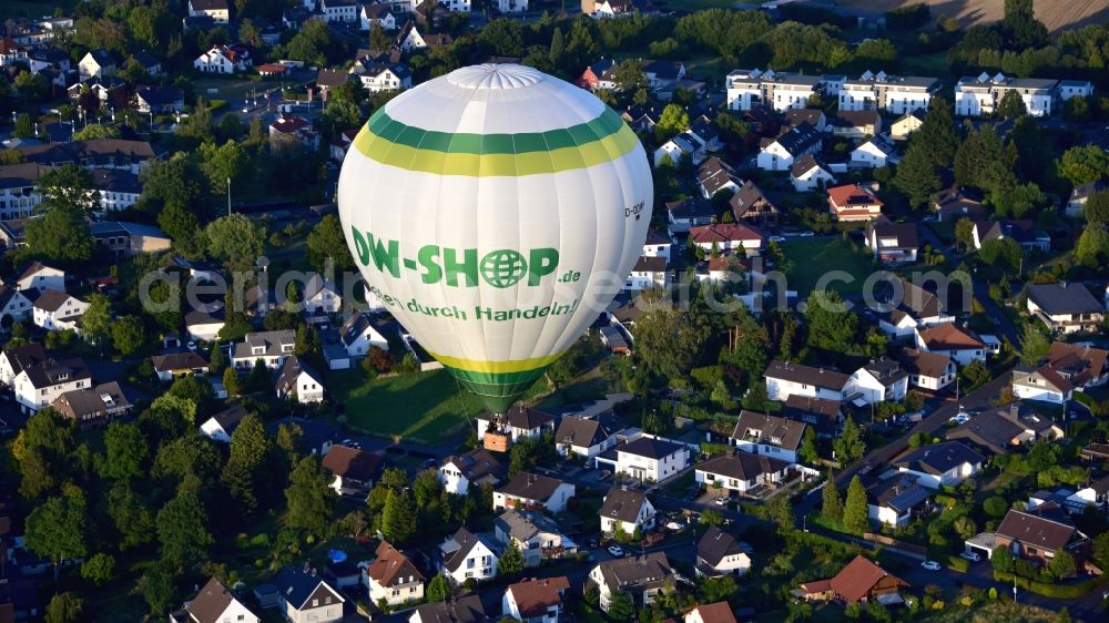 Oberpleis from above - Hot air balloon in flight over Oberpleis in the state North Rhine-Westphalia, Germany