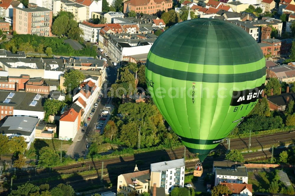 Aerial image Magdeburg - Hot air balloon with of Kennung D-OEKY Mueckenwirt flying in the airspace in Magdeburg in the state Saxony-Anhalt, Germany