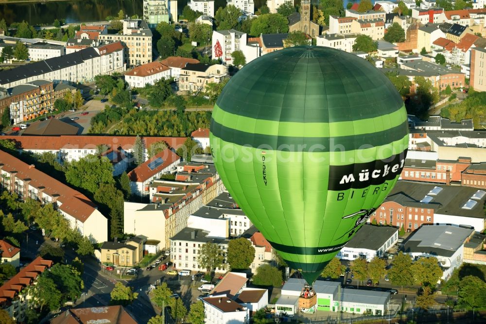 Magdeburg from above - Hot air balloon with of Kennung D-OEKY Mueckenwirt flying in the airspace in Magdeburg in the state Saxony-Anhalt, Germany