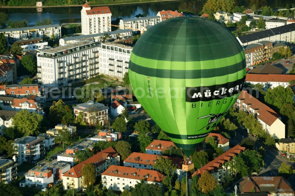 Aerial image Magdeburg - Hot air balloon with of Kennung D-OEKY Mueckenwirt flying in the airspace in Magdeburg in the state Saxony-Anhalt, Germany