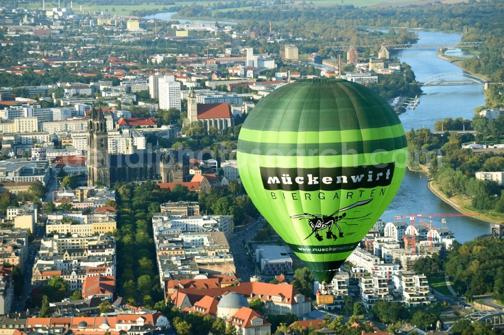 Aerial image Magdeburg - Hot air balloon with of Kennung D-OEKY Mueckenwirt flying in the airspace in Magdeburg in the state Saxony-Anhalt, Germany