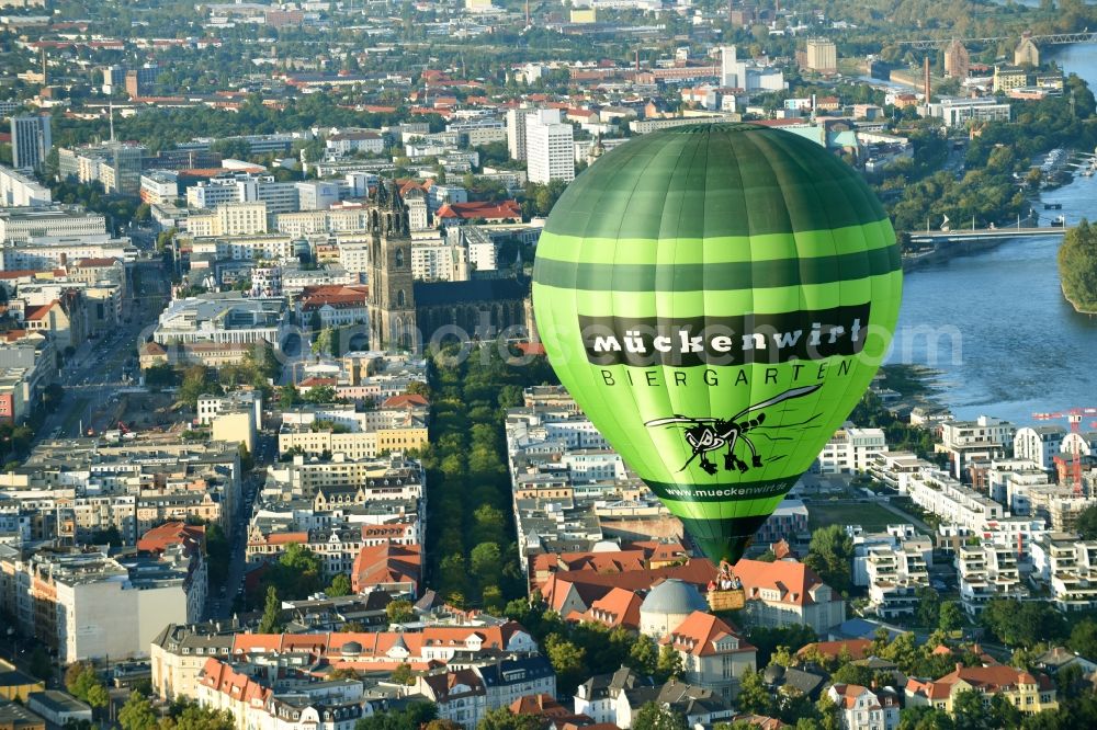 Aerial photograph Magdeburg - Hot air balloon with of Kennung D-OEKY Mueckenwirt flying in the airspace in Magdeburg in the state Saxony-Anhalt, Germany