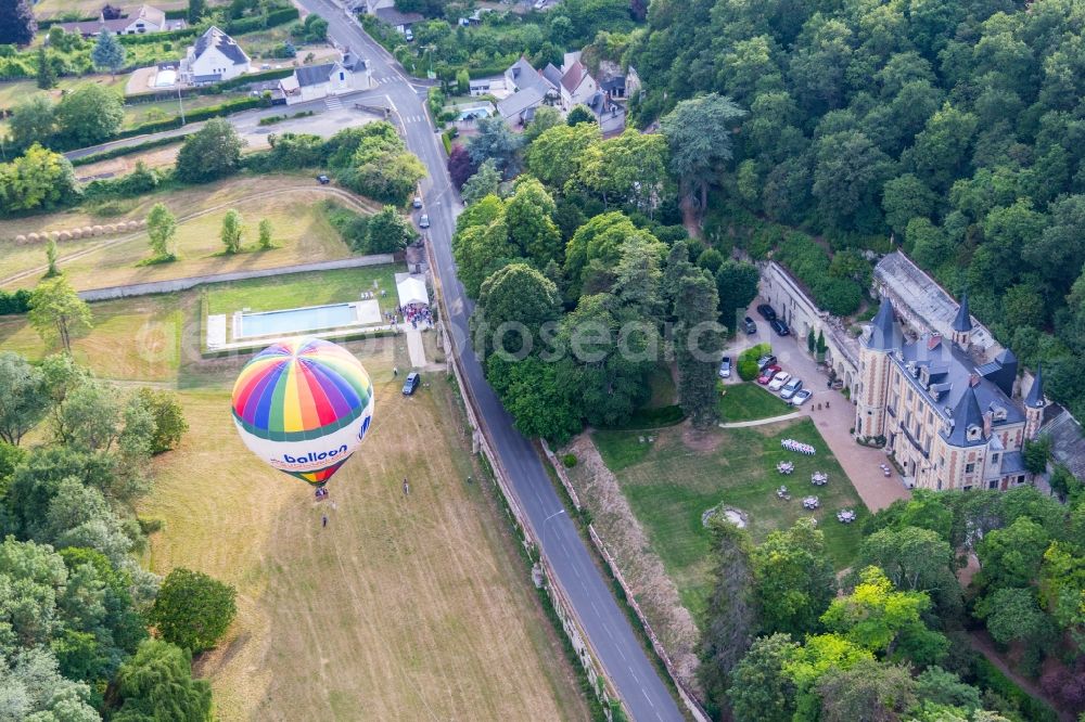 Nazelles-Négron from above - Hot air balloon start on Chateau de Perreux flying over the airspace in Nazelles-Negron in Centre-Val de Loire, France