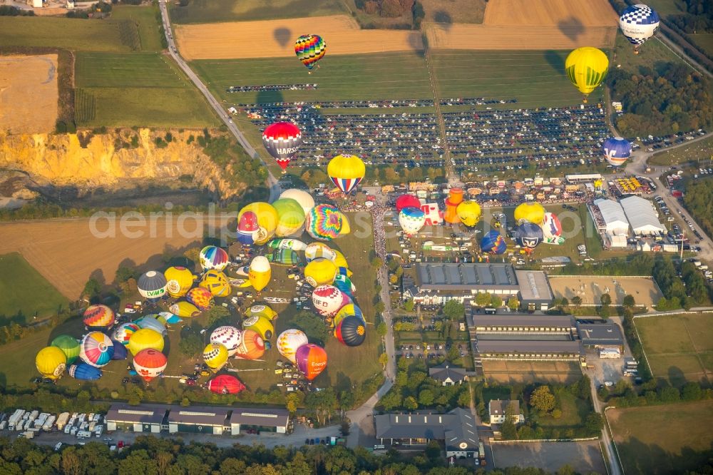 Aerial photograph Warstein - Hot air balloon Warsteiner Montgolfiade flying over the airspace in Warstein in the state North Rhine-Westphalia, Germany