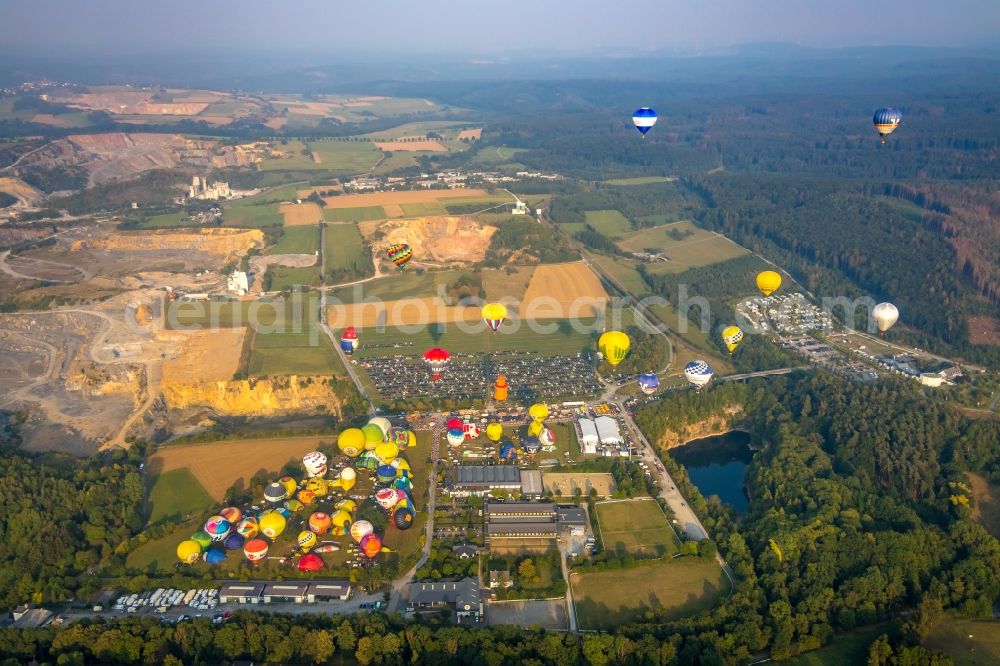 Warstein from above - Hot air balloon Warsteiner Montgolfiade flying over the airspace in Warstein in the state North Rhine-Westphalia, Germany