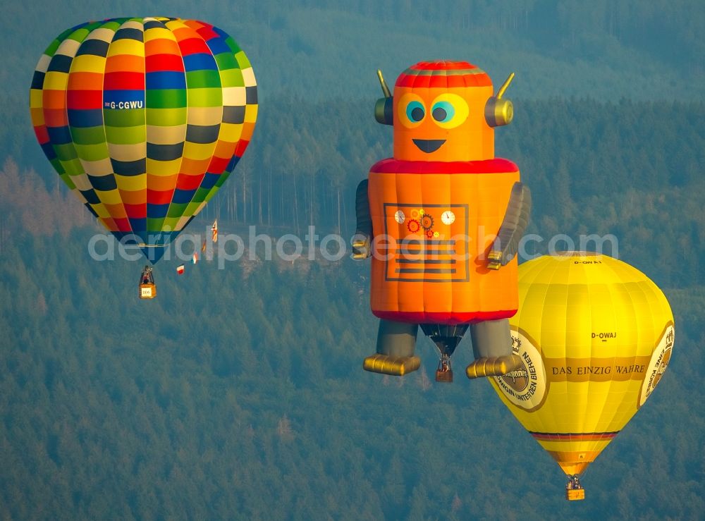 Aerial photograph Warstein - Hot air balloon Warsteiner Montgolfiade flying over the airspace in Warstein in the state North Rhine-Westphalia, Germany