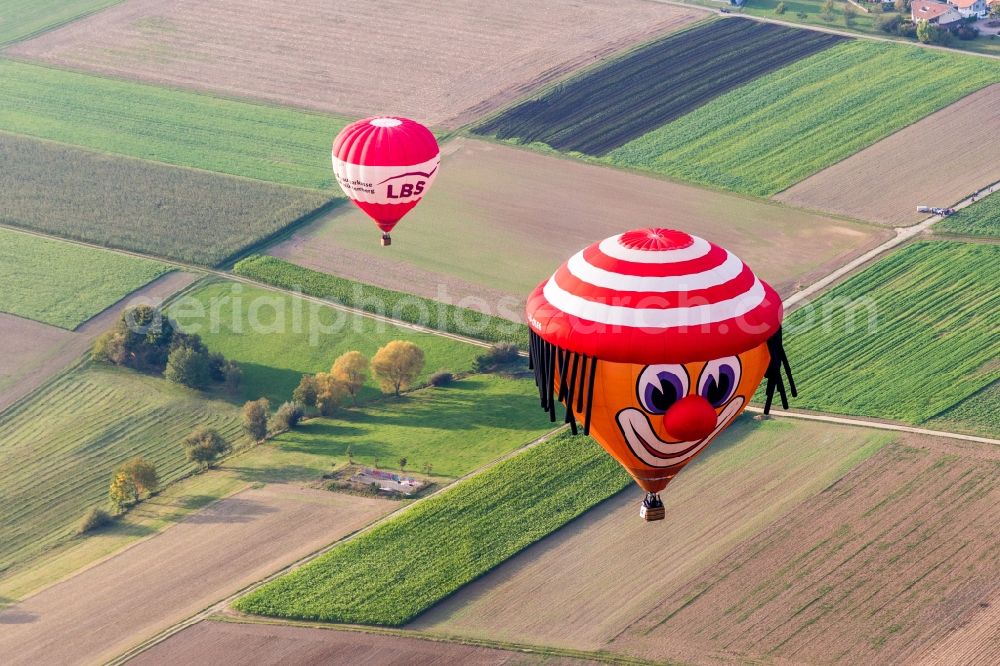 Ölbronn-Dürrn from above - Hot air balloon - one with a clown face - of the internationel Chanmpioinship of Pforzheim 2017 flying over the airspace in Oelbronn-Duerrn in the state Baden-Wuerttemberg, Germany