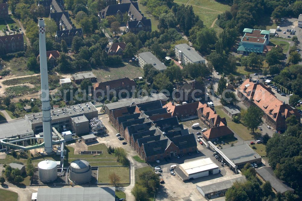 Berlin from above - Blick auf das Heizkraftwerk in Berlin-Buch. Das 1974 erstmals in Betrieb genommene kleinste Berliner Kraftwerk läuft nach dem Prinzip der Kraft-Wärme-Kopplung und wird durch die Vattenfall AG betrieben.