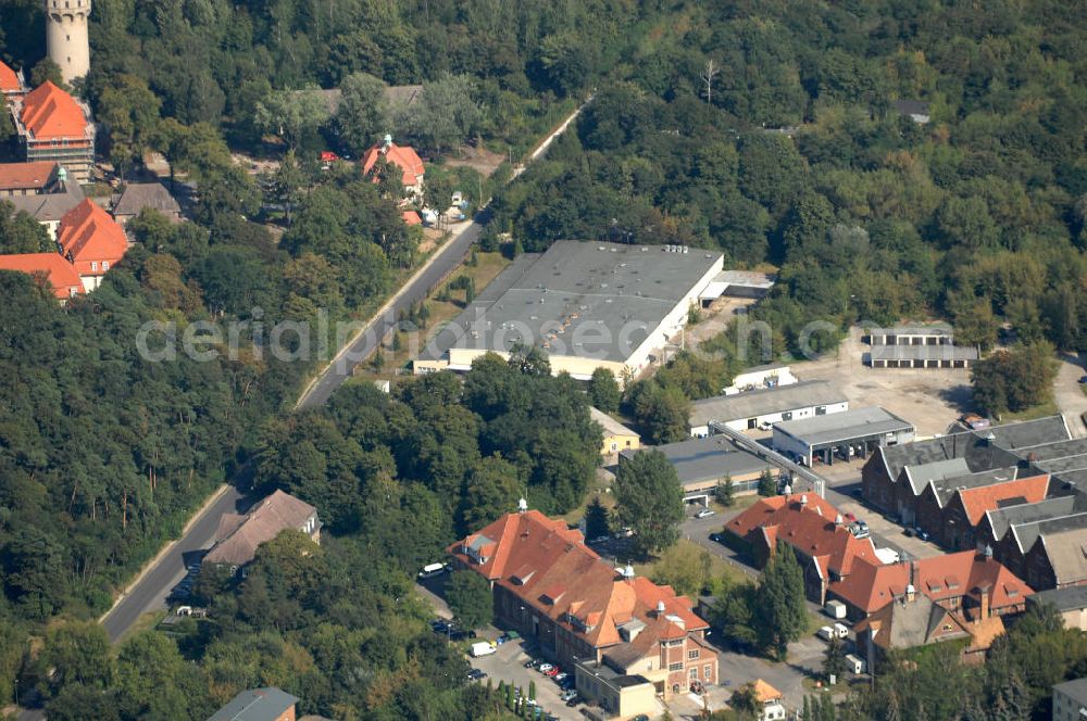 Berlin from the bird's eye view: Blick auf das Heizkraftwerk in Berlin-Buch. Das 1974 erstmals in Betrieb genommene kleinste Berliner Kraftwerk läuft nach dem Prinzip der Kraft-Wärme-Kopplung und wird durch die Vattenfall AG betrieben.