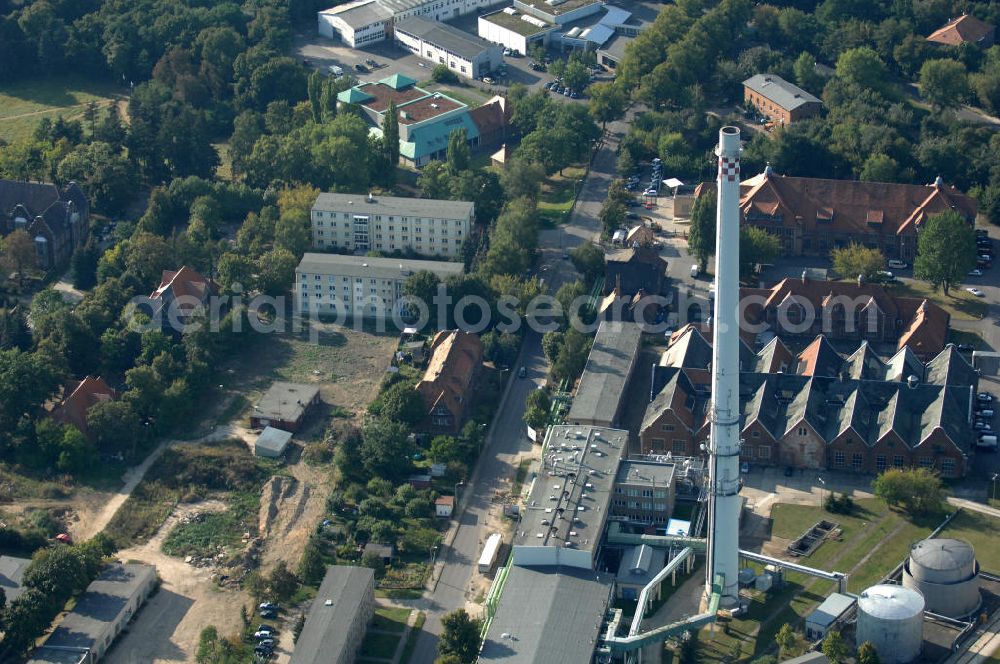 Berlin from the bird's eye view: Blick auf das Heizkraftwerk in Berlin-Buch. Das 1974 erstmals in Betrieb genommene kleinste Berliner Kraftwerk läuft nach dem Prinzip der Kraft-Wärme-Kopplung und wird durch die Vattenfall AG betrieben.