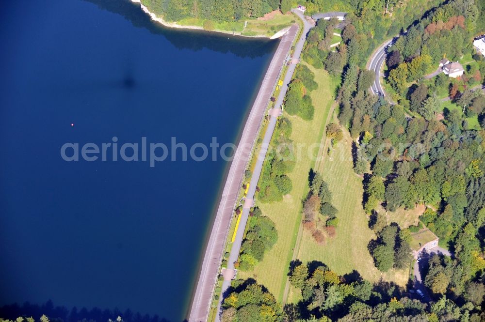 Meschede from above - View of the Henne dam in Meschede in the state North Rhine-Westphalia. The dam is located in the nature park Homert and dams the water of the Henne