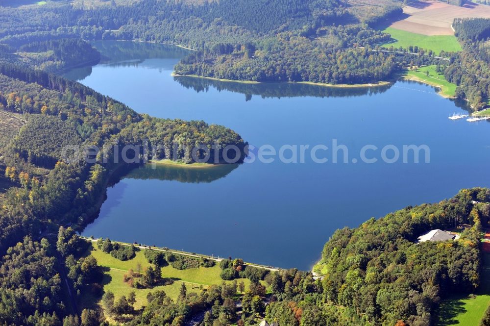 Meschede from above - View of the Henne dam in Meschede in the state North Rhine-Westphalia. The dam is located in the nature park Homert and dams the water of the Henne