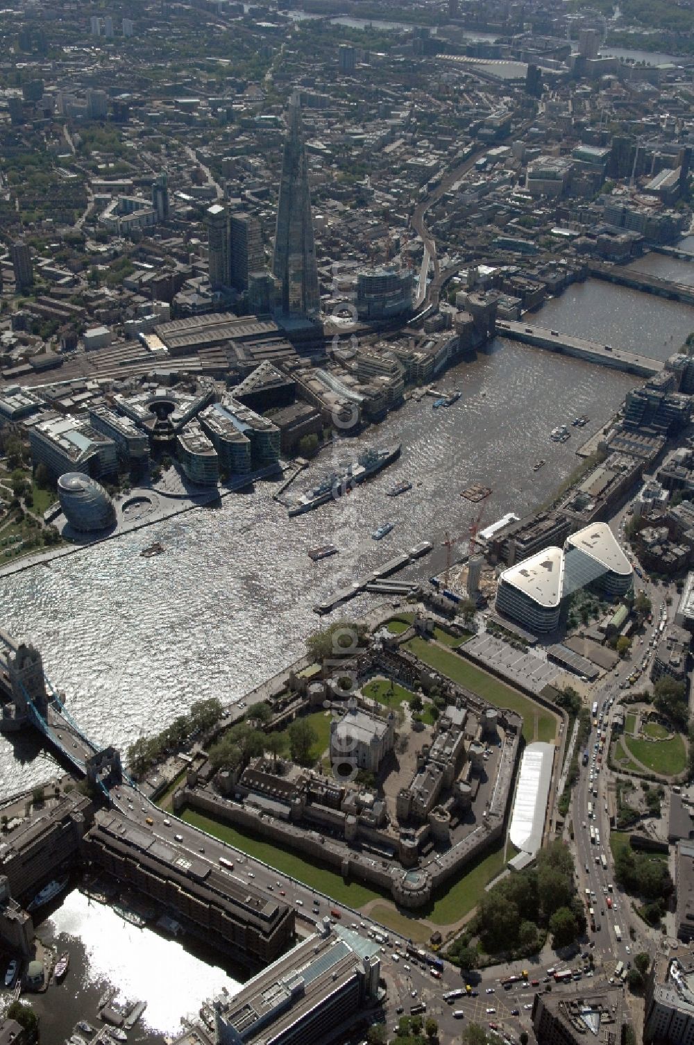 Aerial image London - View of the Tower of London, UNESCO World Heritage Site. The medieval fortress served as a castle, an armory, a royal palace and a prison. Today in the Tower, the British Crown Jewels are kept and an extensive historical collection of weapons is shown