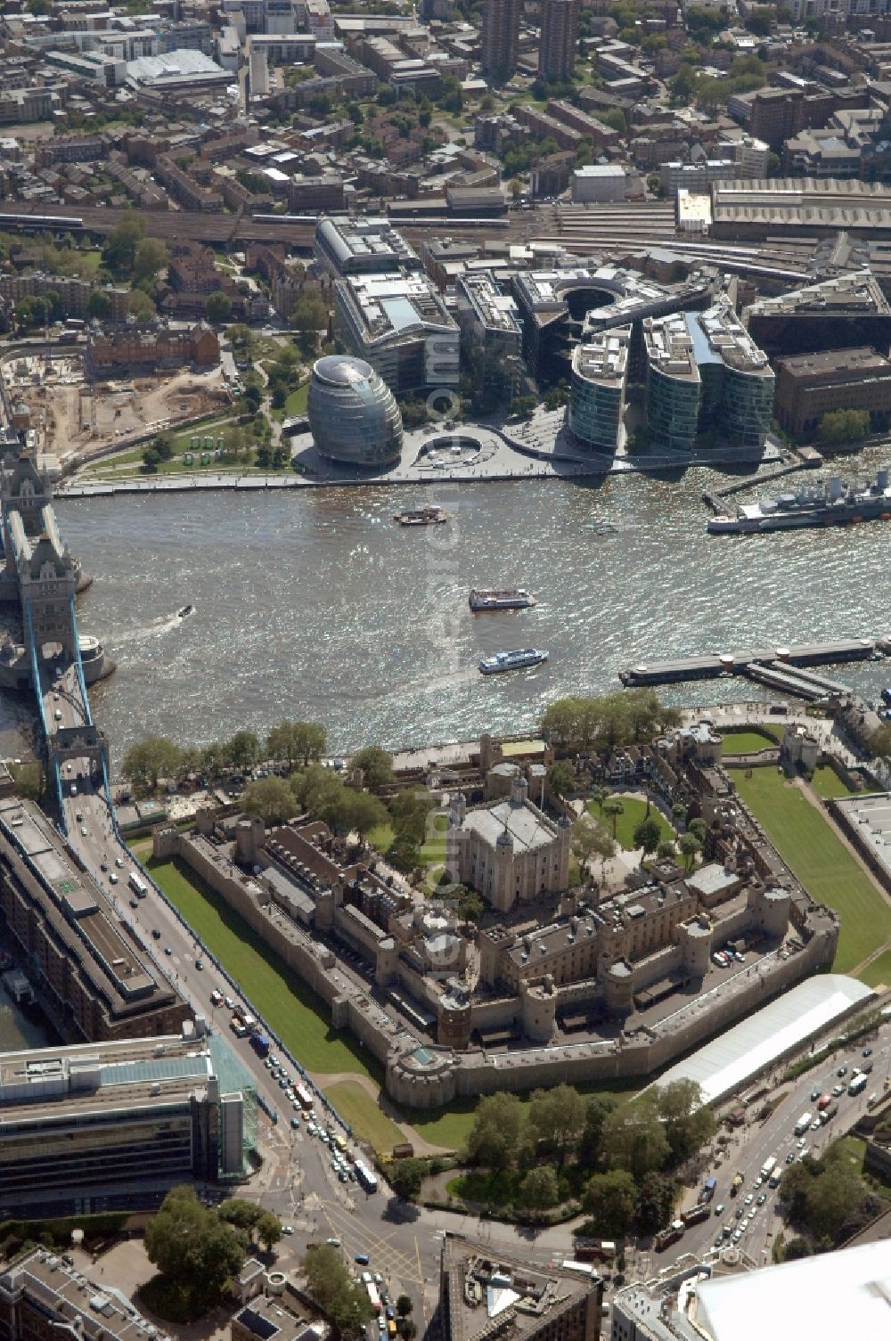 Aerial photograph London - View of the Tower of London, UNESCO World Heritage Site. The medieval fortress served as a castle, an armory, a royal palace and a prison. Today in the Tower, the British Crown Jewels are kept and an extensive historical collection of weapons is shown