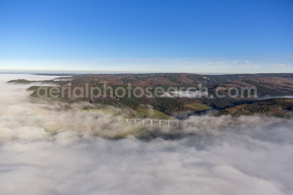 Aerial image Meschede - Autumn - fog weather landscape over the building of the motorway A46 - Viaduct Wennemen in Meschede in the state of North Rhine-Westphalia