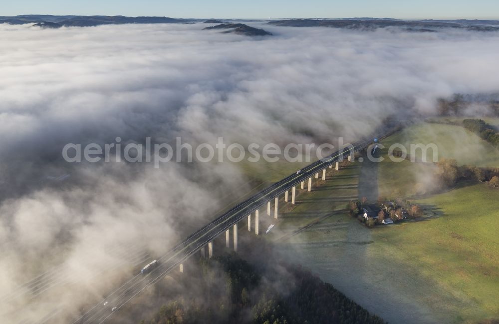 Aerial image Meschede - Autumn - fog weather landscape over the building of the motorway A46 - Viaduct Wennemen in Meschede in the state of North Rhine-Westphalia