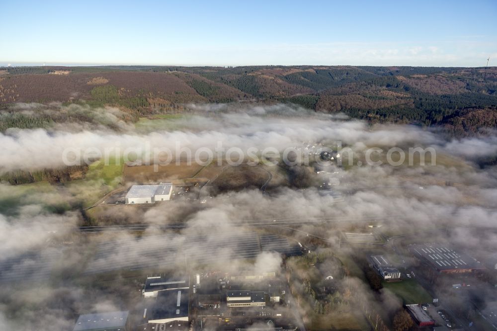 Aerial photograph Meschede - Autumn - weather landscape over the industrial area Ernste in Meschede in the state of North Rhine-Westphalia