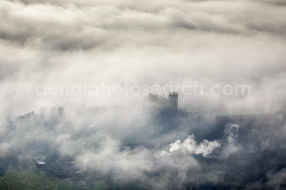 Aerial photograph Meschede - Autumn - Weather landscape over the space enclosed by clouds and haze Abbey Königsmünster in Meschede in the state of North Rhine-Westphalia