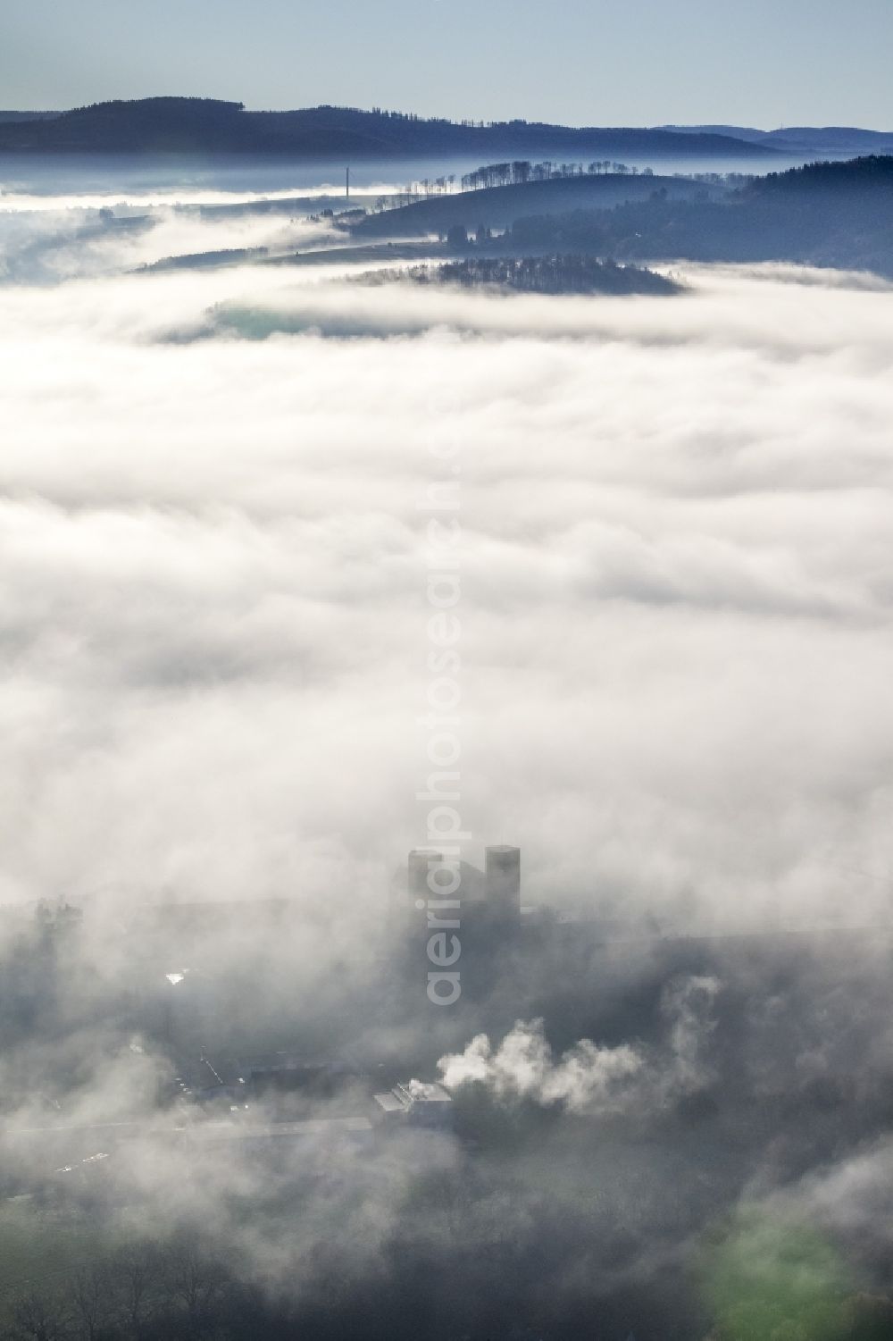 Meschede from above - Autumn - Weather landscape over the space enclosed by clouds and haze Abbey Königsmünster in Meschede in the state of North Rhine-Westphalia