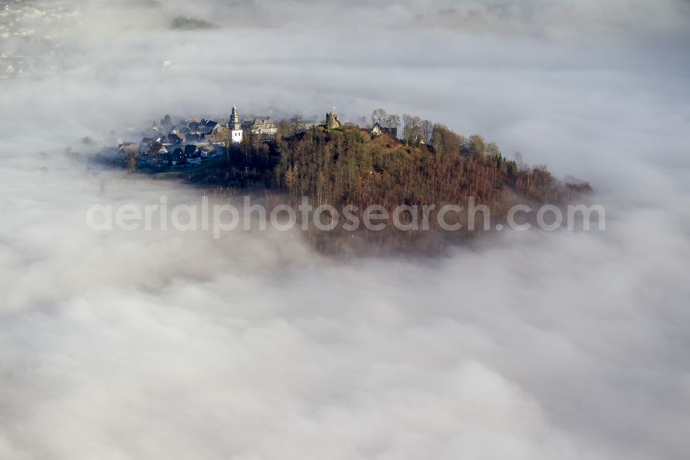 Aerial photograph Meschede OT Bergstadt Eversberg - Autumn - Weather landscape over the space enclosed by clouds and haze district Eversberg in Meschede in the state of North Rhine-Westphalia