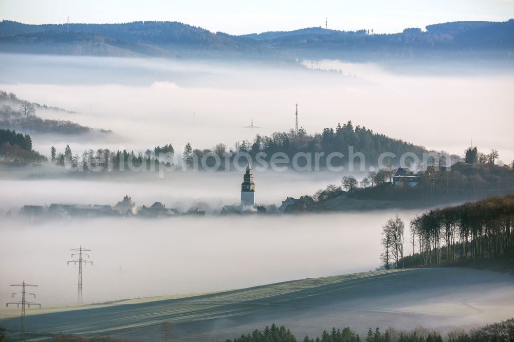 Aerial image Meschede OT Bergstadt Eversberg - Autumn - Weather landscape over the space enclosed by clouds and haze district Eversberg in Meschede in the state of North Rhine-Westphalia